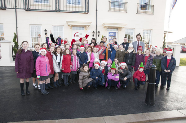 School carol singers spread festive cheer at Sherford